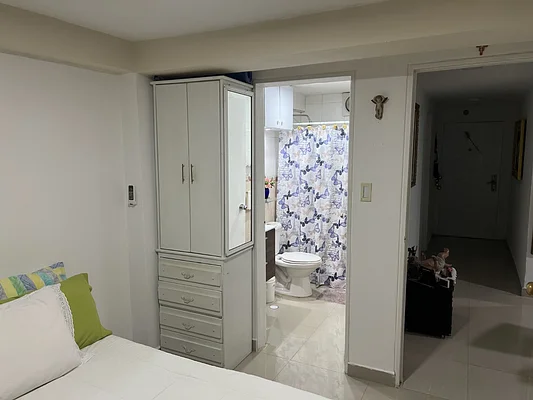 Master bedroom with bed