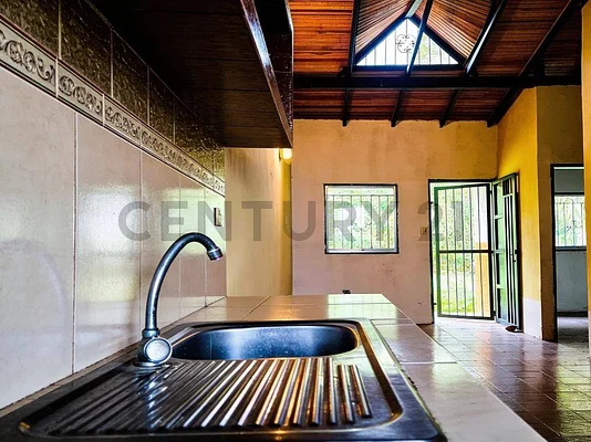 Bright open living room with sofa