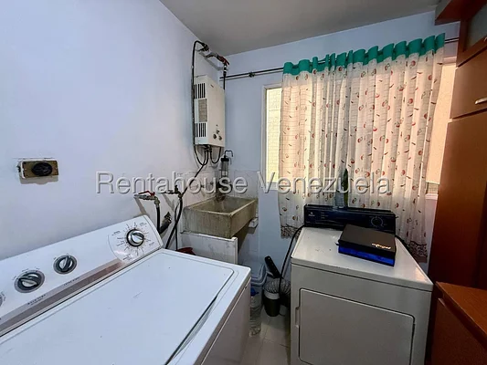 Bathroom with vanity and mirror
