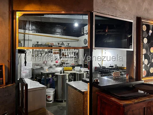 Open kitchen with stainless appliances