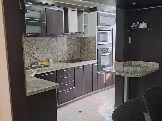 Sleek kitchen with stainless appliances