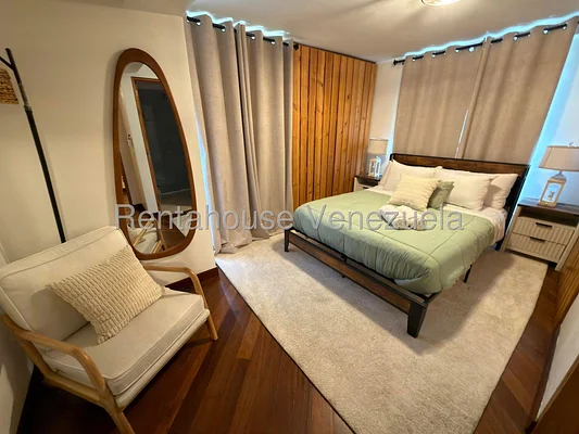 Bedroom with balcony view