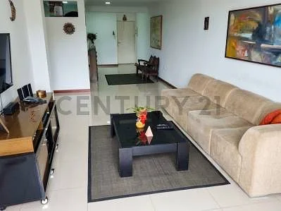 Spacious master bedroom with large windows