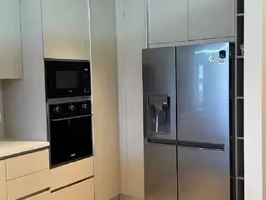 Contemporary kitchen with stainless appliances