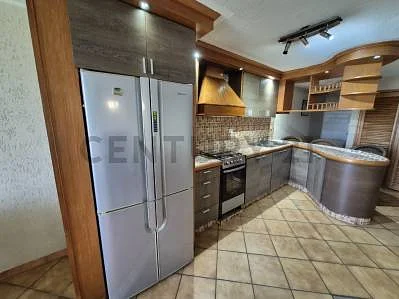 Open kitchen with stainless appliances