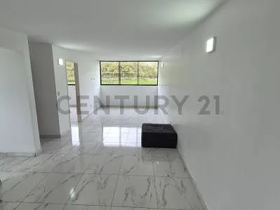Spacious living area with sofa
