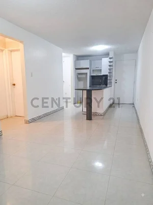 Open kitchen with white cabinets