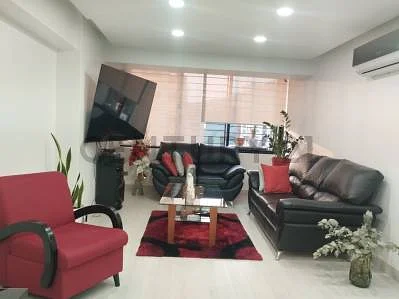 Spacious living room with sofa