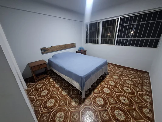 Master bedroom with carpet flooring