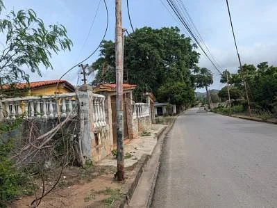 Dirt road leading into property