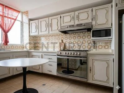 Kitchen with white cabinets
