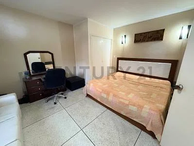 Second bedroom with neutral carpet