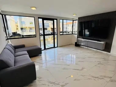 Bright living room with sofa