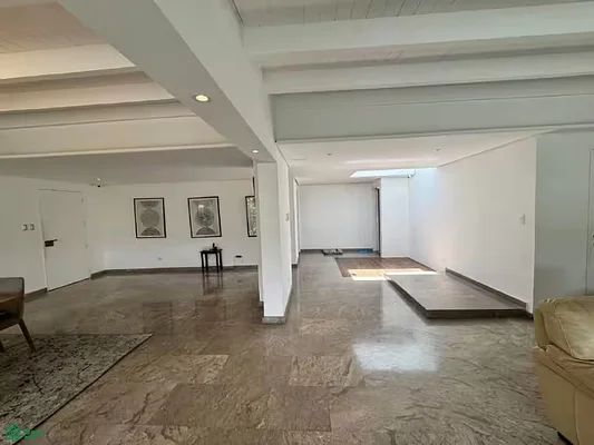 Spacious living room with large windows