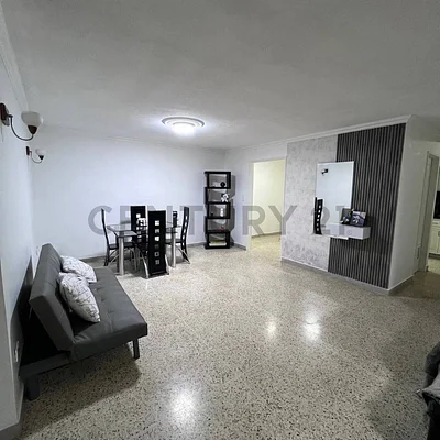 Bright living area with sofa